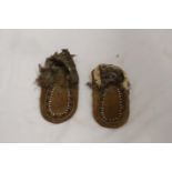 A PAIR OF SMALL CHILD'S NORTH AMERICAN MOCCASSINS WITH BEAD WORK TO THE FRONT