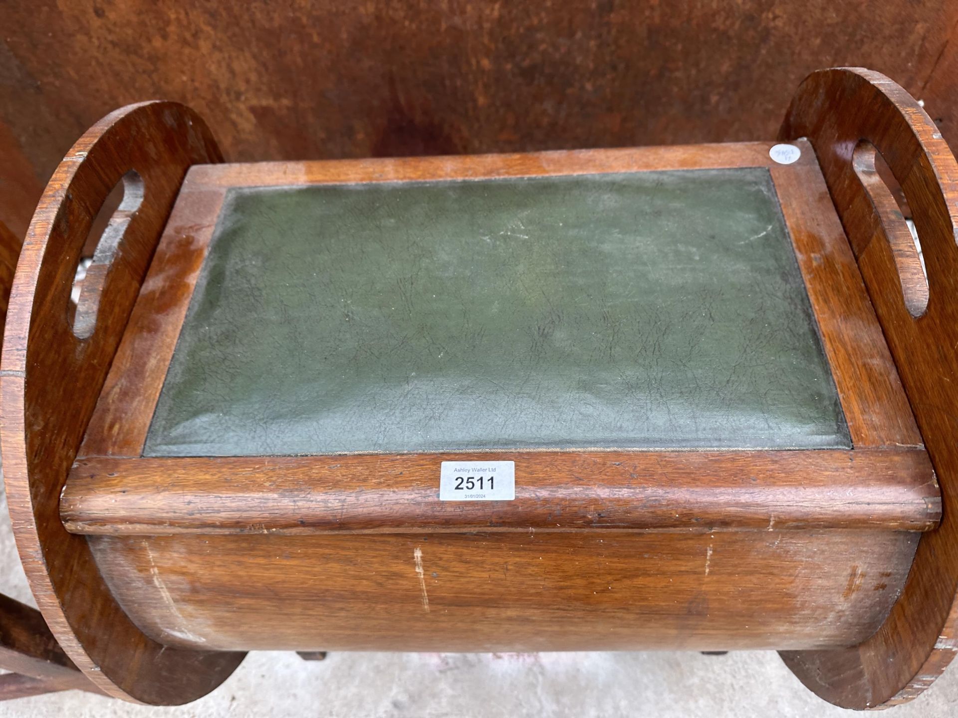 AN ART DECO MAHOGANY PIANO STOOL WITH CIRCULAR ENDS AND HINGED SEAT - Image 3 of 4