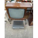 A RETRO G.E.C COLOUR TELEVISION AND A FERGUSON VHS PLAYER