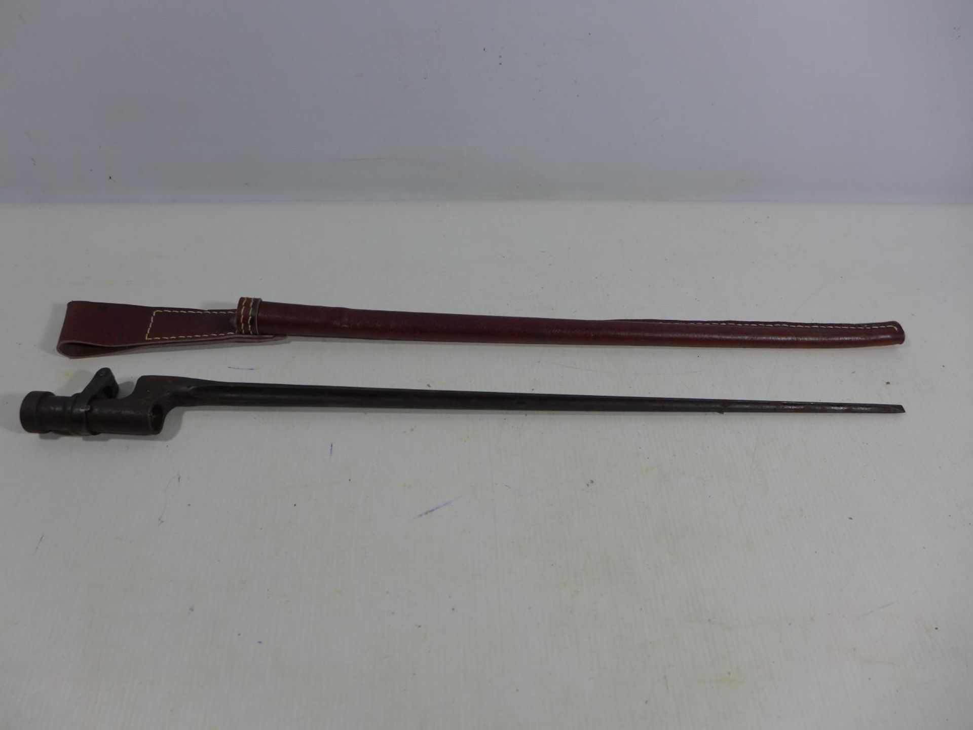 A POSSIBLY RUSSIAN SOCKET BAYONET AND SCABBARD, 43CM BLADE, LENGTH 50CM