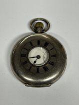 A .935 SILVER HALF HUNTER POCKET WATCH GROSS WEIGHT 77.57 GRAMS, REQUIRES ATTENTION