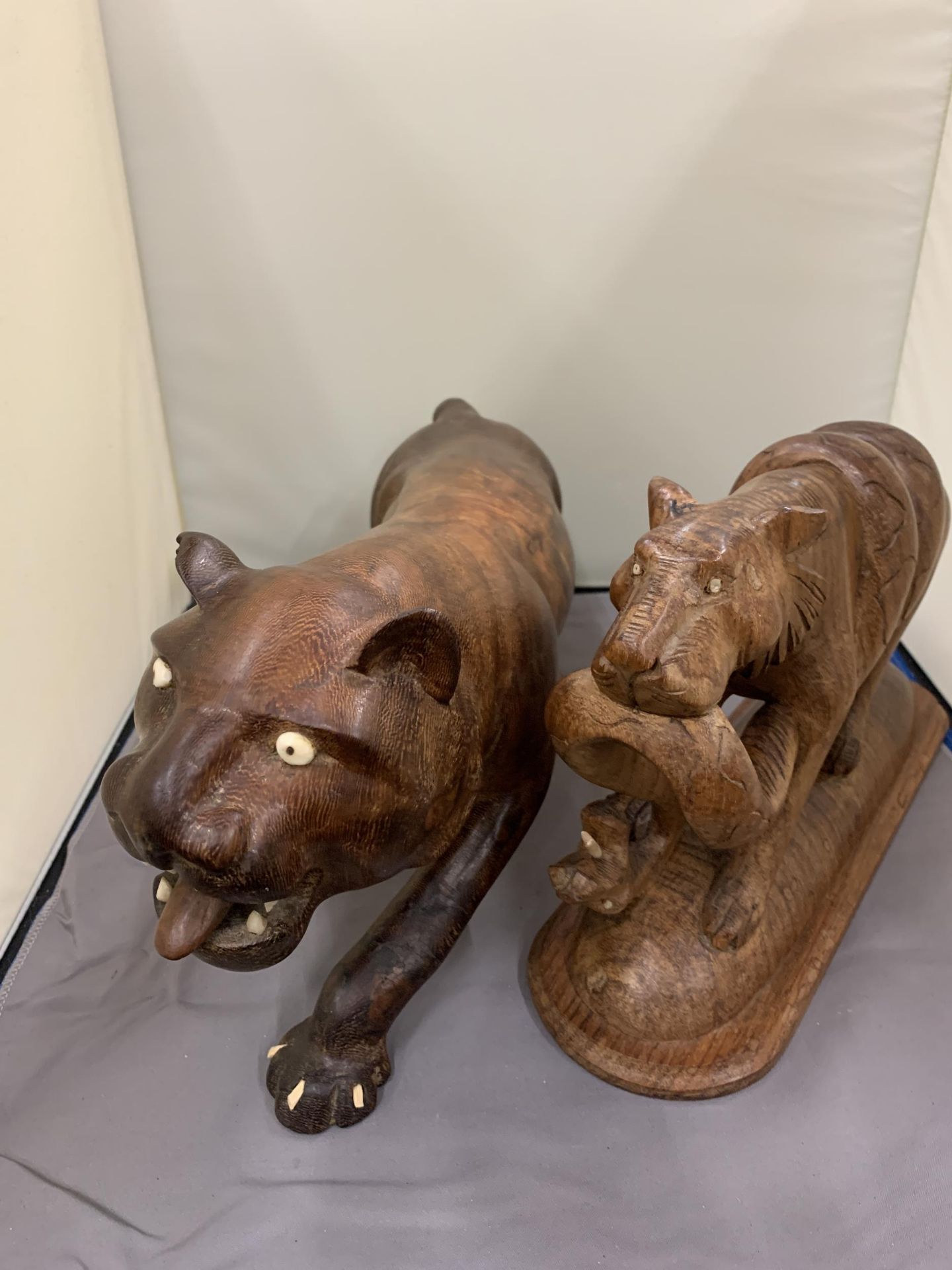 TWO TREEN CARVINGS OF WILD CATS ONE WITH A SNAKE AS PRAY - Image 2 of 3