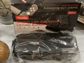 A SWITCH LITE ACCESSORY DELUXE BUNDLE, BOXED