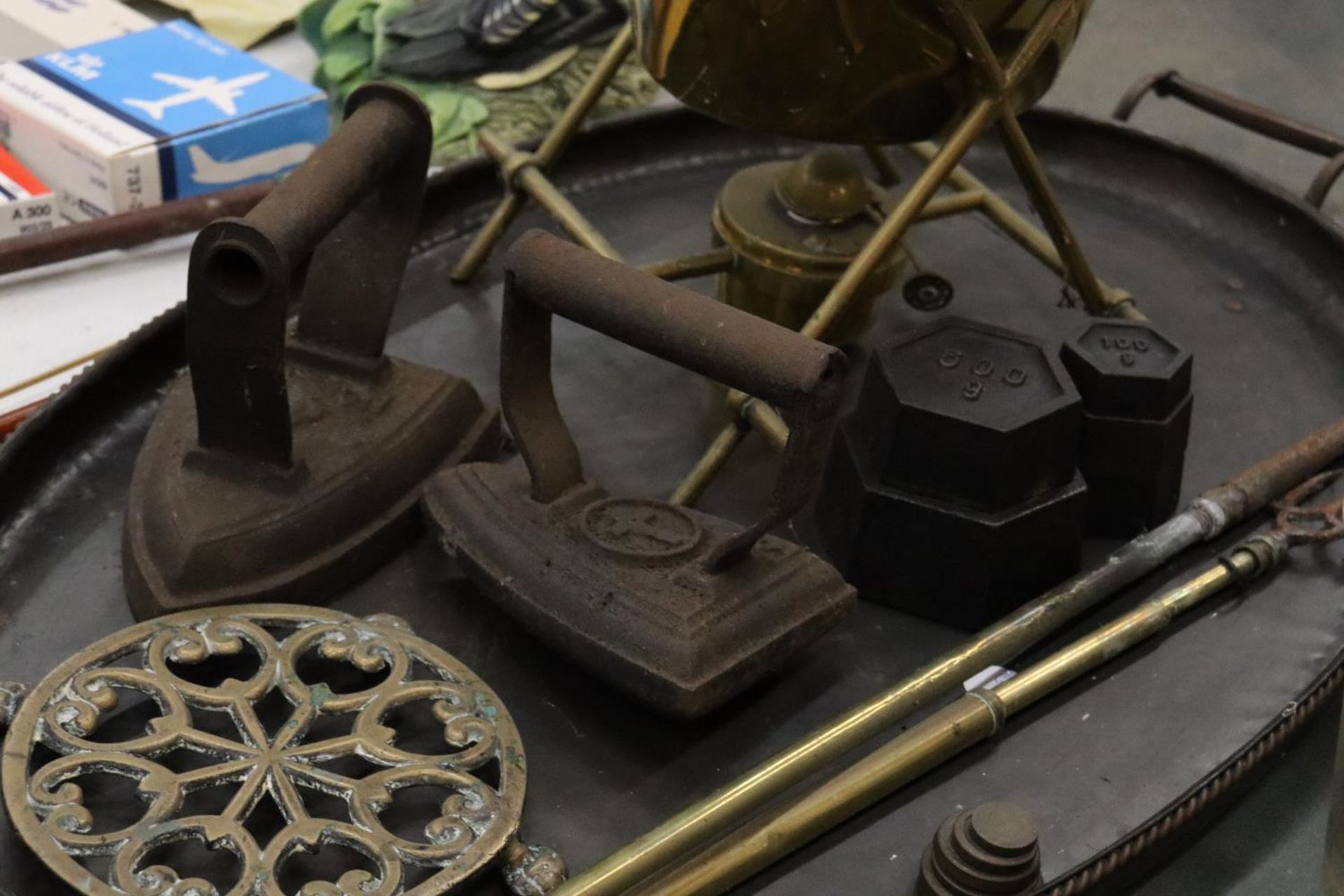 A VINTAGE LOT TO INCLUDE A LARGE METAL TRAY, A BRASS SPIRIT KETTLE AND BURNER, FLAT IRONS, - Image 4 of 5