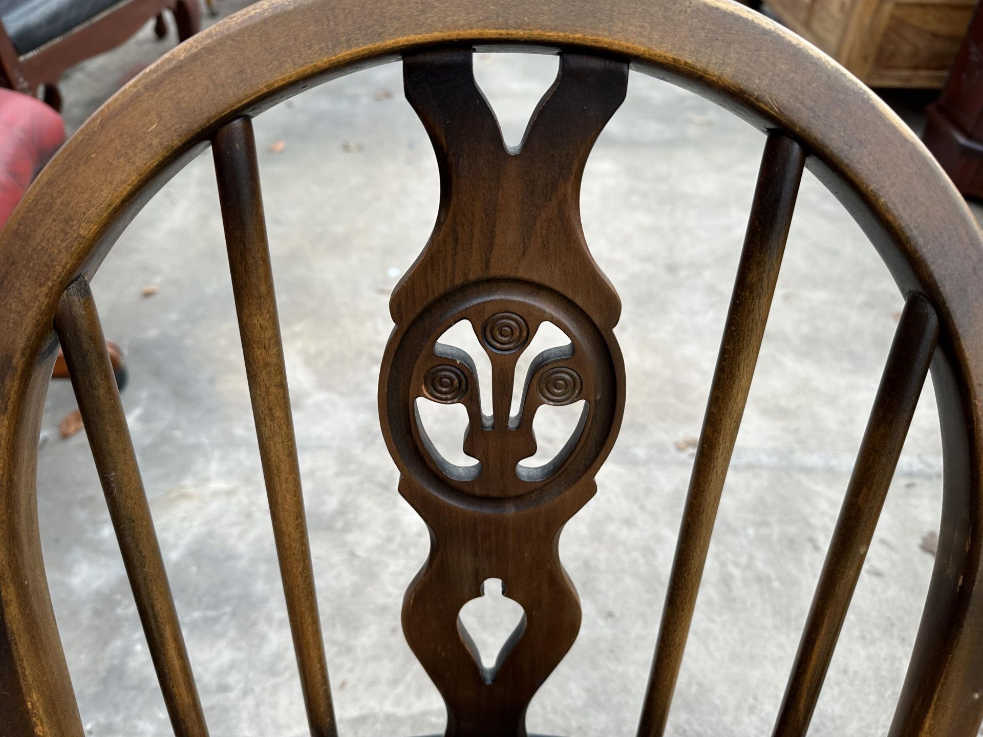 A PAIR OF ERCOL BLUE LABEL PLUME OF FEATHERS CARVER CHAIRS - Image 2 of 6