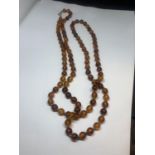 AN AMBER NECKLACE