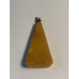 AN ABSTRACT STYLE BELIEVED AMBER PENDANT