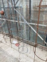 A PAIR OF WIRE METAL GARDEN PLANT GROWING SUPPORTS (H:157CM)