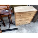 A MODERN SMALL PINE CHEST OF THREE DRAWERS, 24" WIDE AND A MODERN TRIPOD WINE TABLE