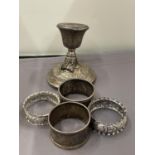 FIVE VARIOUS ITEMS OF MARKED SILVER TO INCLUDE NAPKIN RINGS AND A WEIGHTED CANDLESTICK (A/F) GROSS