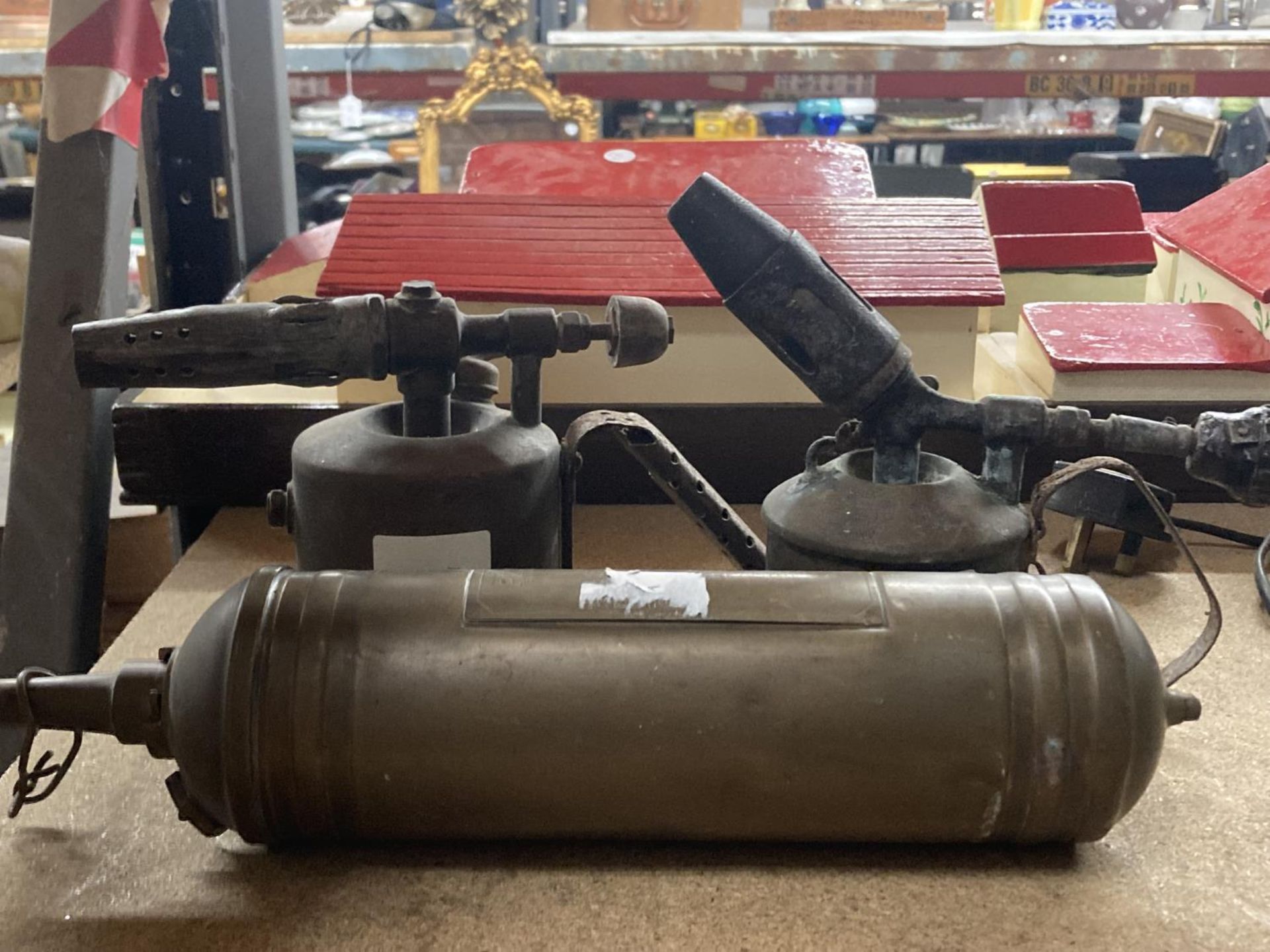 THREE ITEMS TO INCLUDE A VINTAGE FIRE EXTINGUISHER AND TWO BLOW TORCHES