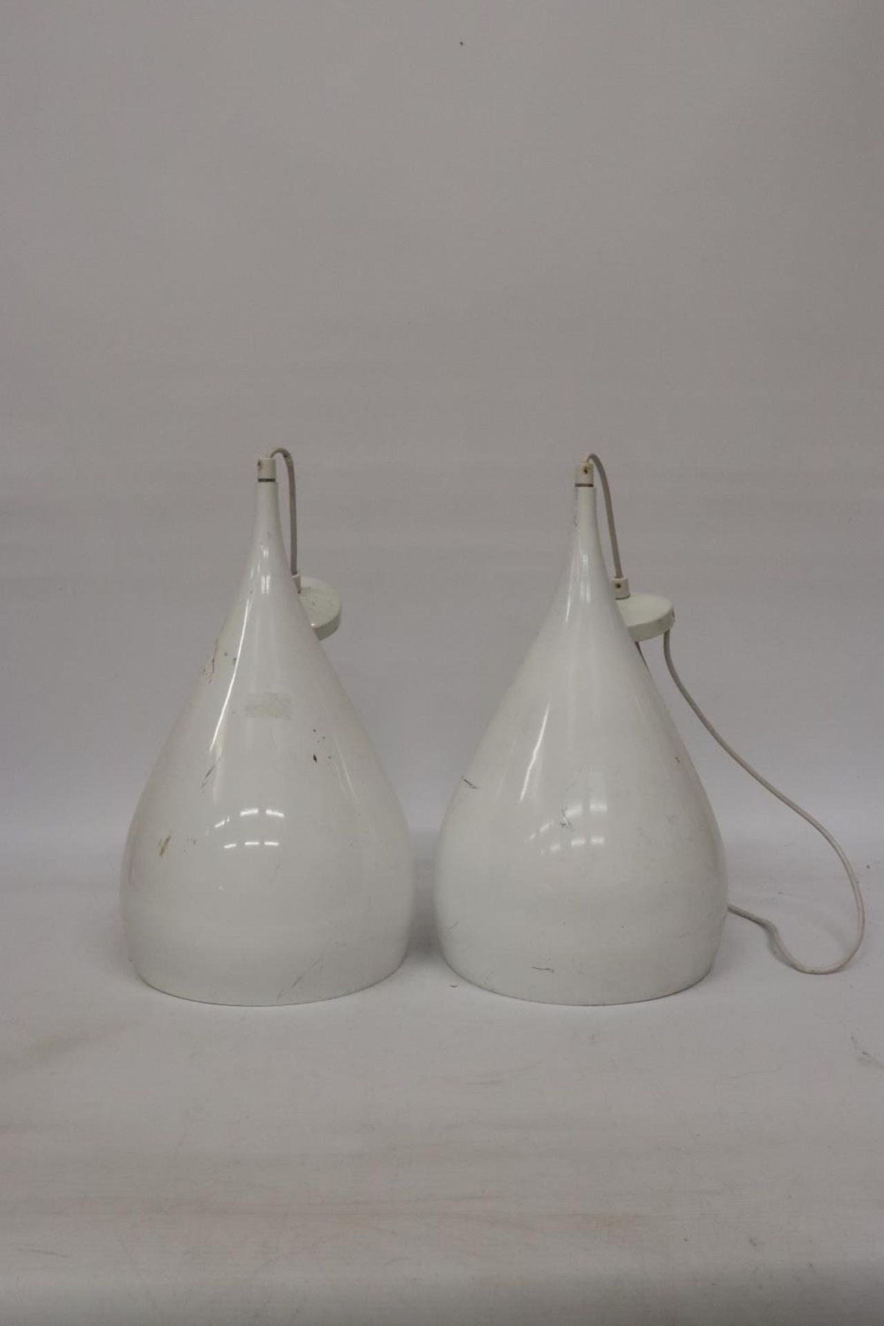 A PAIR OF INDUSTRIAL WHITE, METAL PEARL DROP LIGHTS, HEIGHT 43CM