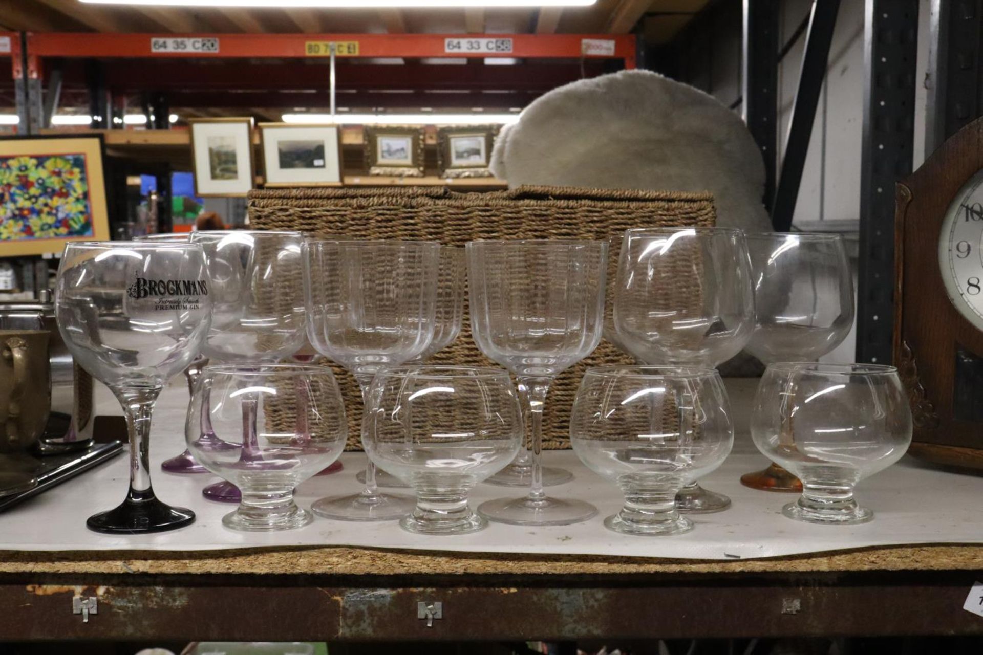 A QUANTITY OF GIN GLASSES AND BOWLS IN A BASKET