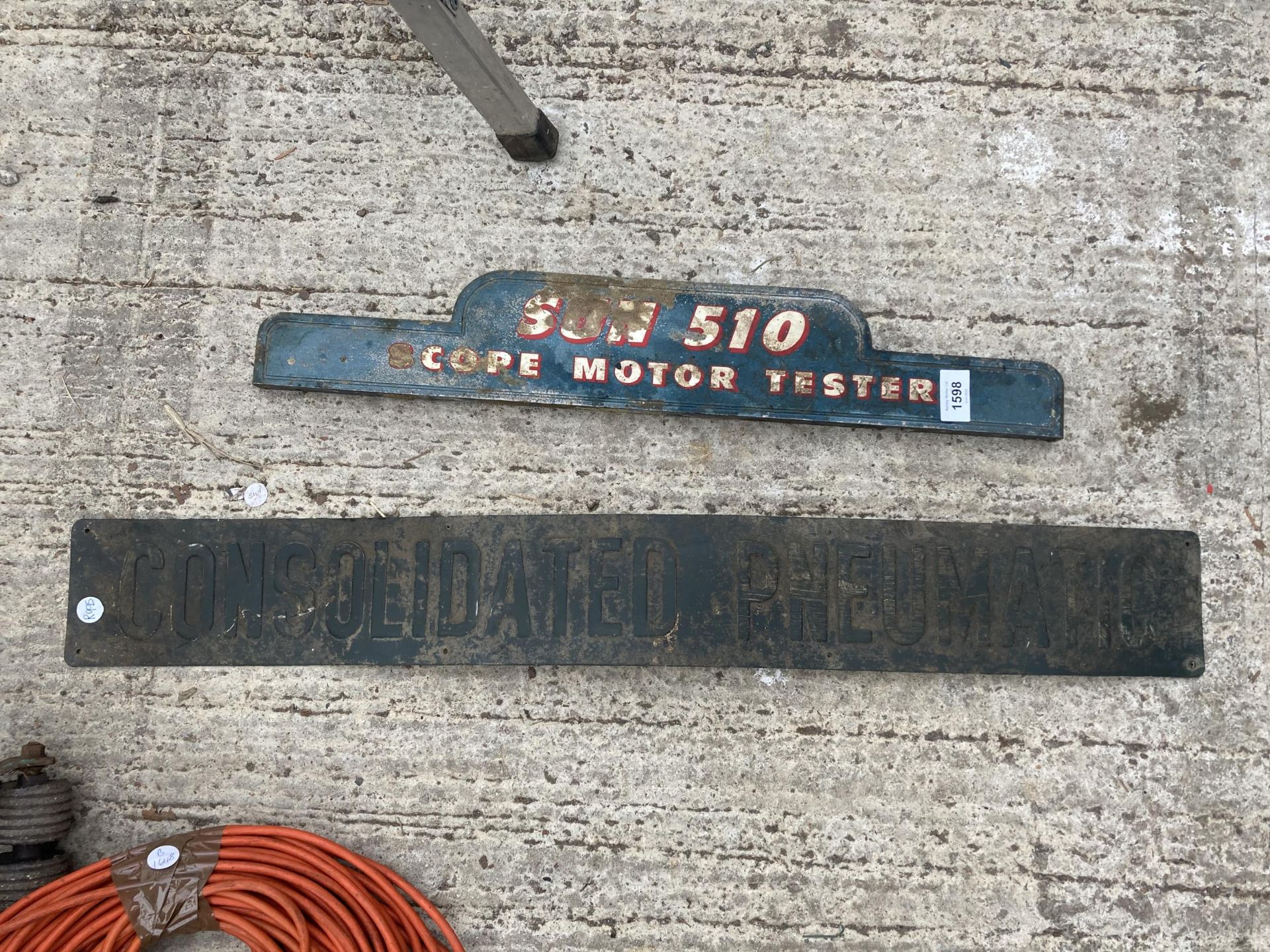A VINTAGE CAST ALLOY 'SCOPE MOTOR TESTER' SIGN AND A FURTHER TIN 'CONSOLIDATED PNEUMATIC' SIGN