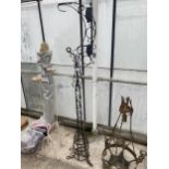 A DECORATIVE VINTAGE WROUGHT IRON HANGING STAND