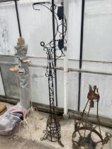 A DECORATIVE VINTAGE WROUGHT IRON HANGING STAND