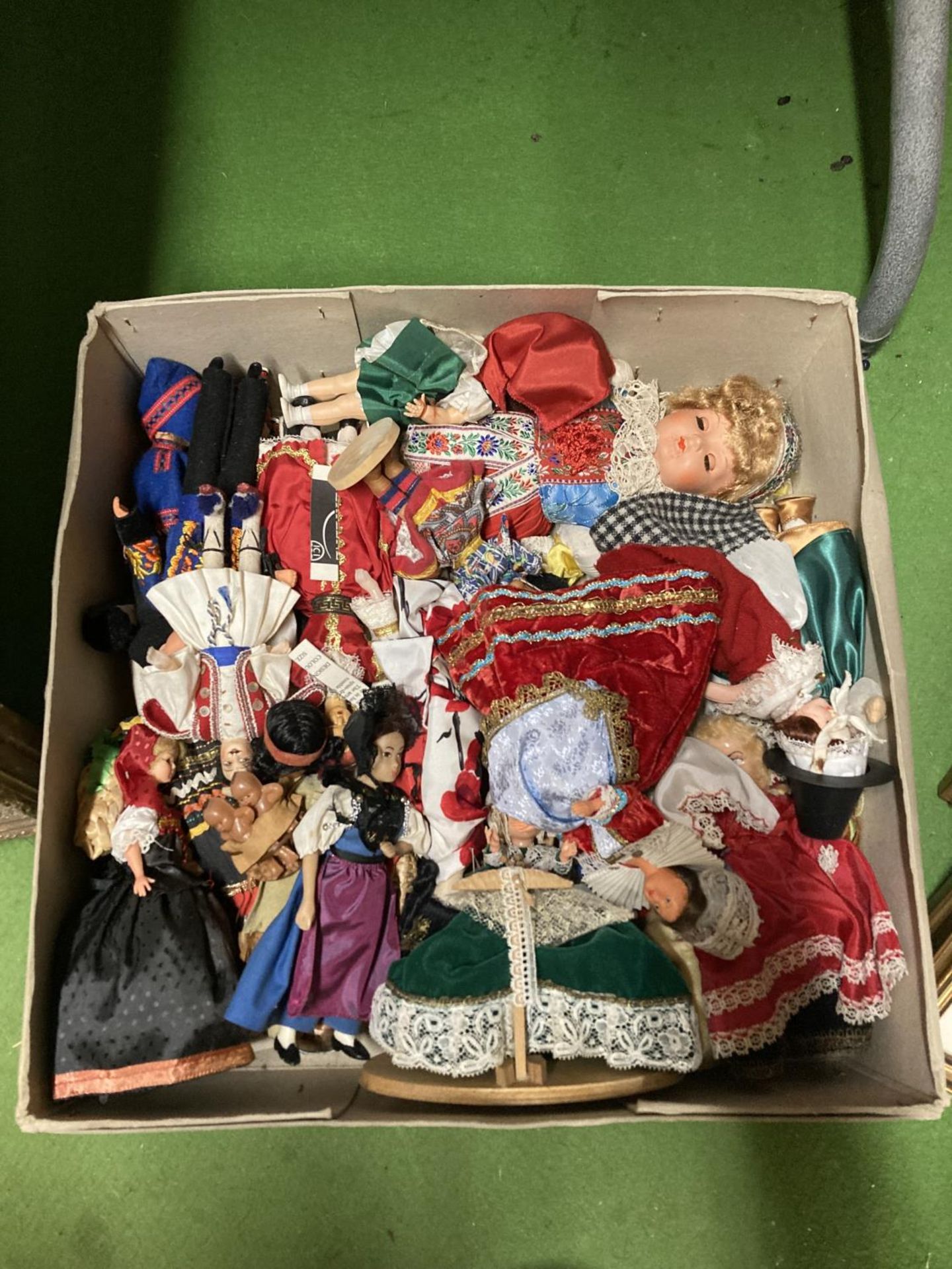A LARGE COLLECTION OF DOLLS FROM AROUND THE WORLD