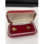A PAIR OF 18 CARAT GOLD AND DIAMOND EARRINGS IN A PRESENTATION BOX