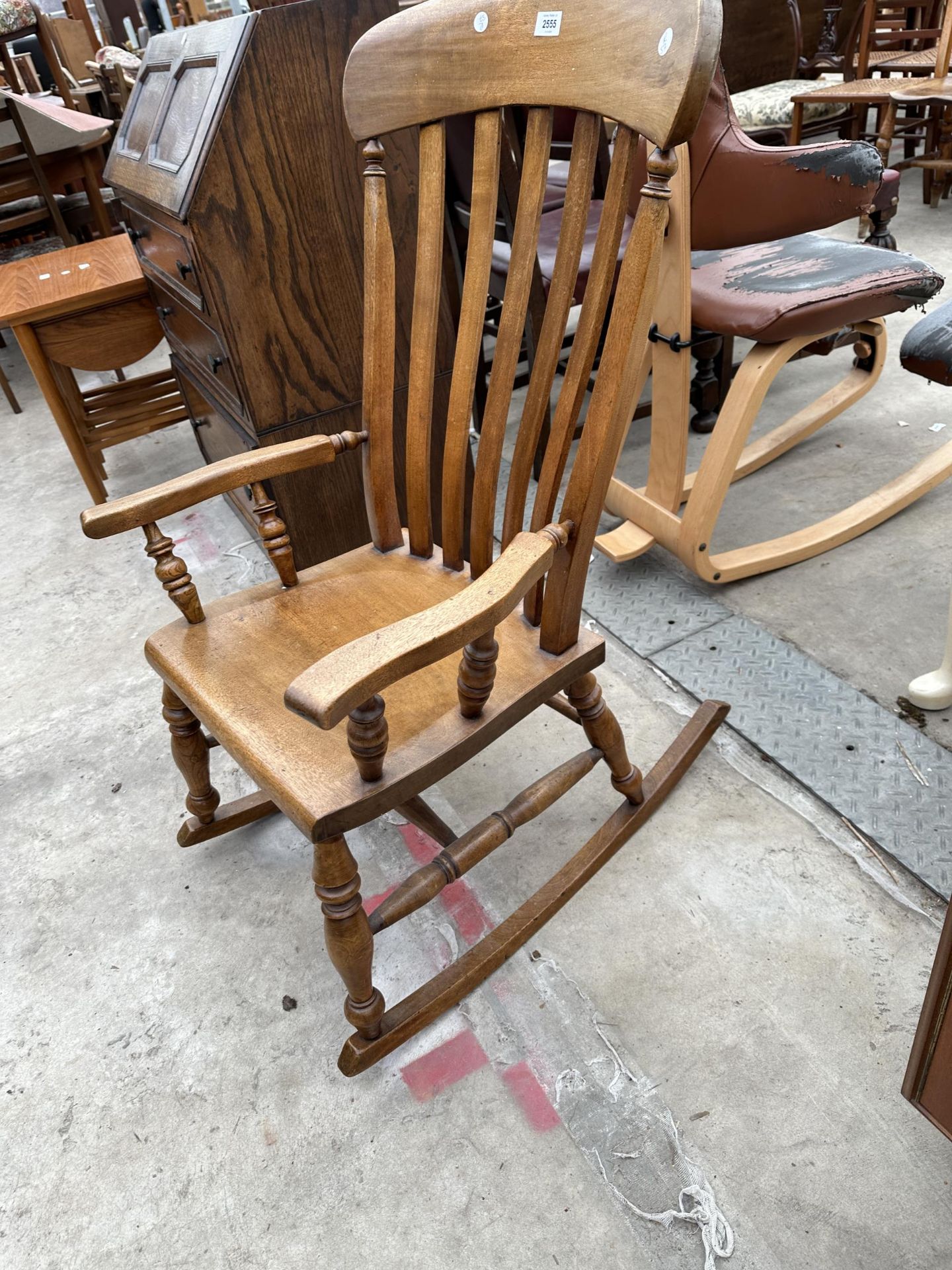 A VICTORIAN STYLE ELM AND BEECH LATH BACK ROCKING CHAIR - Image 3 of 3