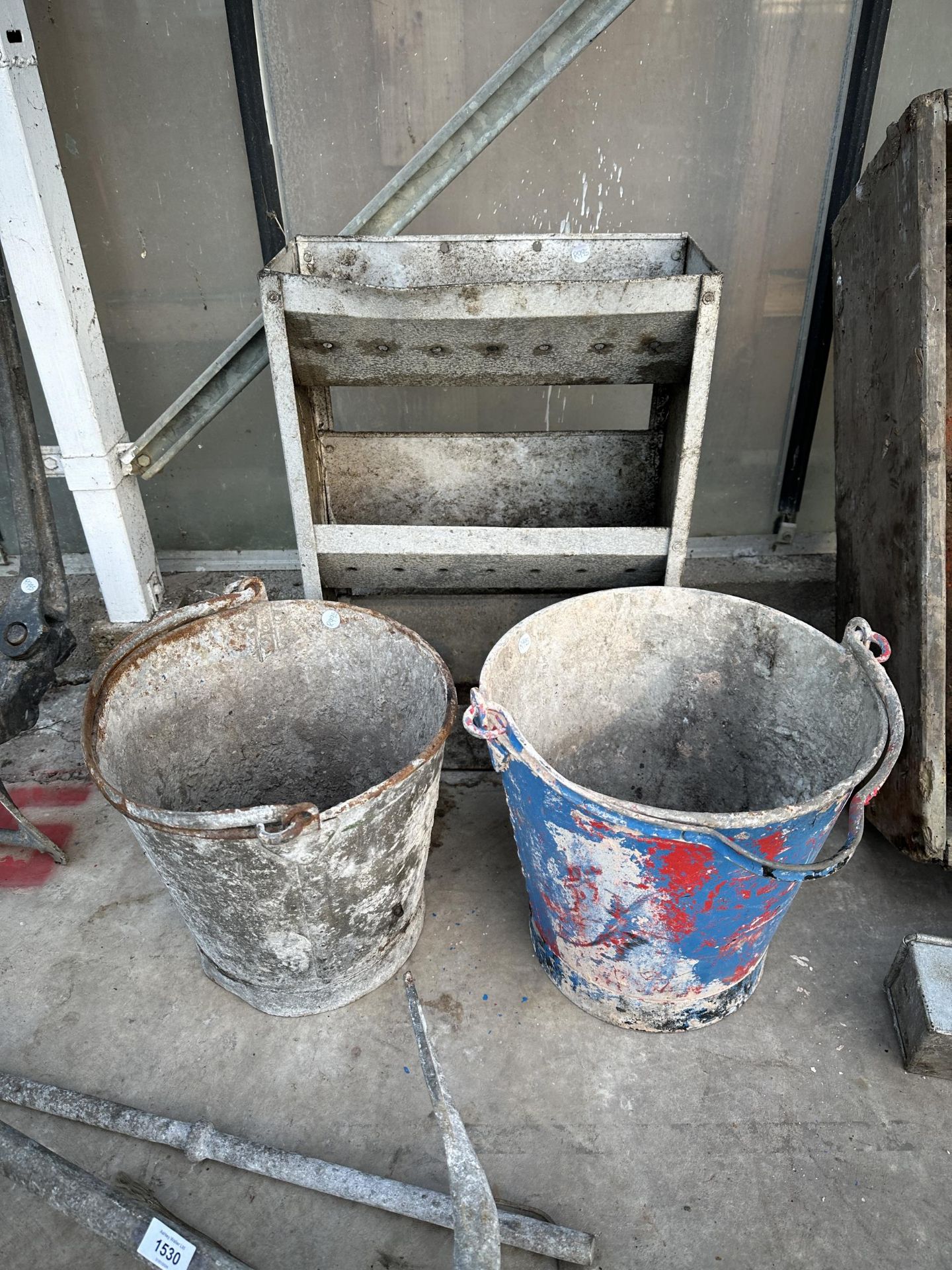 THREE GALVANISED ITEMS TO INCLUDE TWO BUCKETS AND A THREE TIER PLANTER