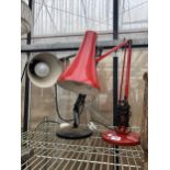 A RED ANGLE POISE LAMP AND A BLACK MODEL 90 ANGLE POISE LAMP