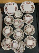 A VINTAGE FLORAL PATTERNED PART TEASET TO INCLUDE CAKE PLATES, CREAM JUG, SUGAR BOWL, CUPS,