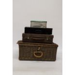 A WICKER PICNIC BASKET, SMALL LEATHER SUITCASE AND TWO TINS