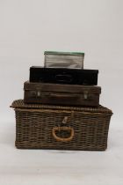 A WICKER PICNIC BASKET, SMALL LEATHER SUITCASE AND TWO TINS