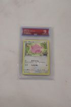 A CHANSEY POKEMON CARD, GRADED NUMBER 9, NEAR MINT