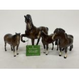 FOUR ROYAL DOULTON BROWN GLOSS HORSES