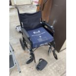 AN AS NEW LOMAX WHEEL CHAIR