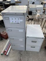 A FOUR DRAWER METAL FILING CABINET AND A FURTHER TWO DRAWER METAL FILING CABINET