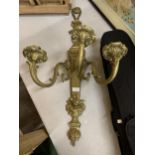 A BRASS WALL MOUNTED THREE BRANCH CANDELABRA