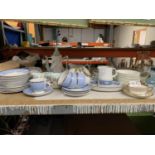 A LARGE QUANTITY OF CHINA TEAWARE TO INCLUDE A DOULTON CUPS, SAUCERS AND BOWLS AND QUEEN ANNE '