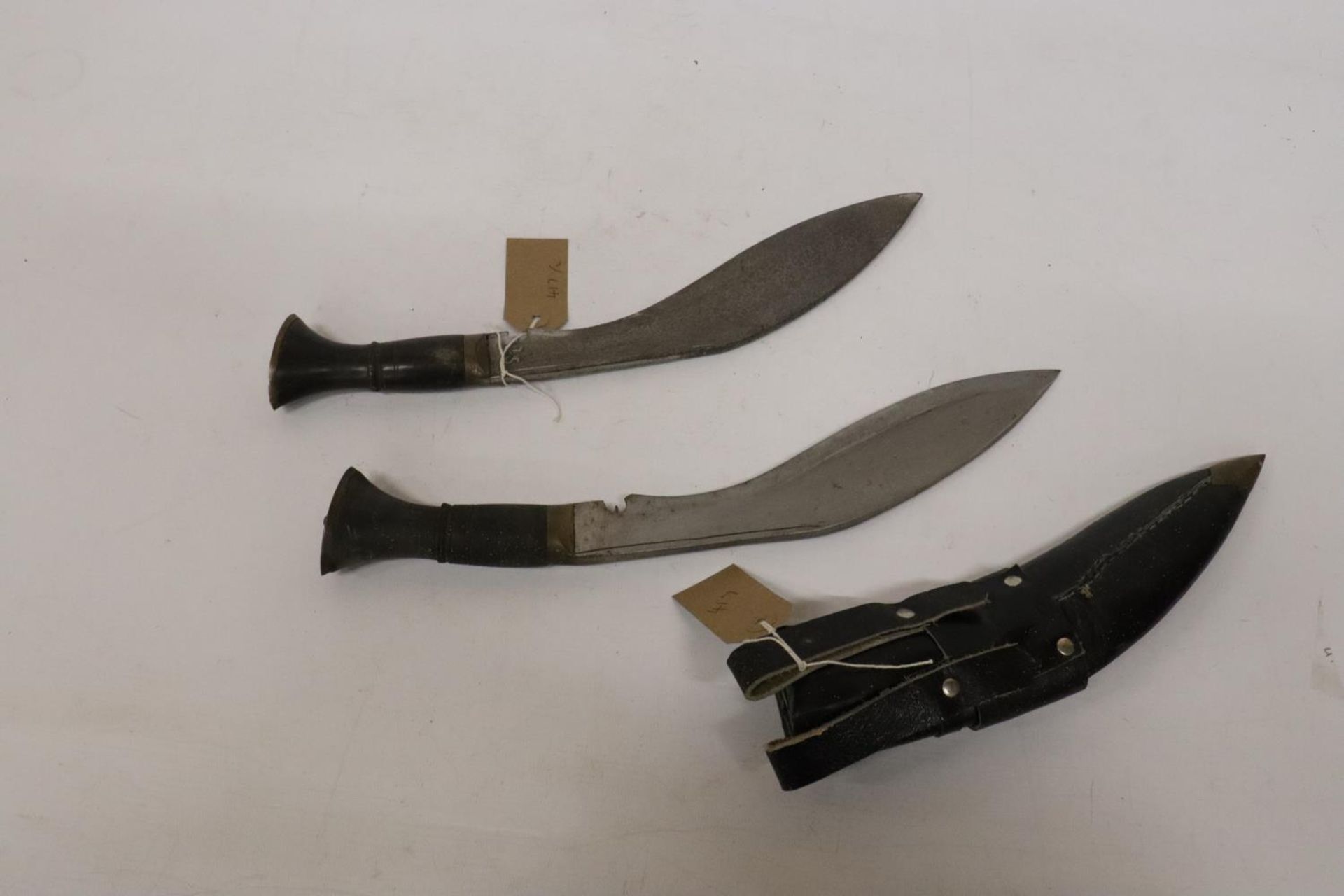 TWO MID 20TH CENTURY KUKRI KNIVES, 28CM BLADES