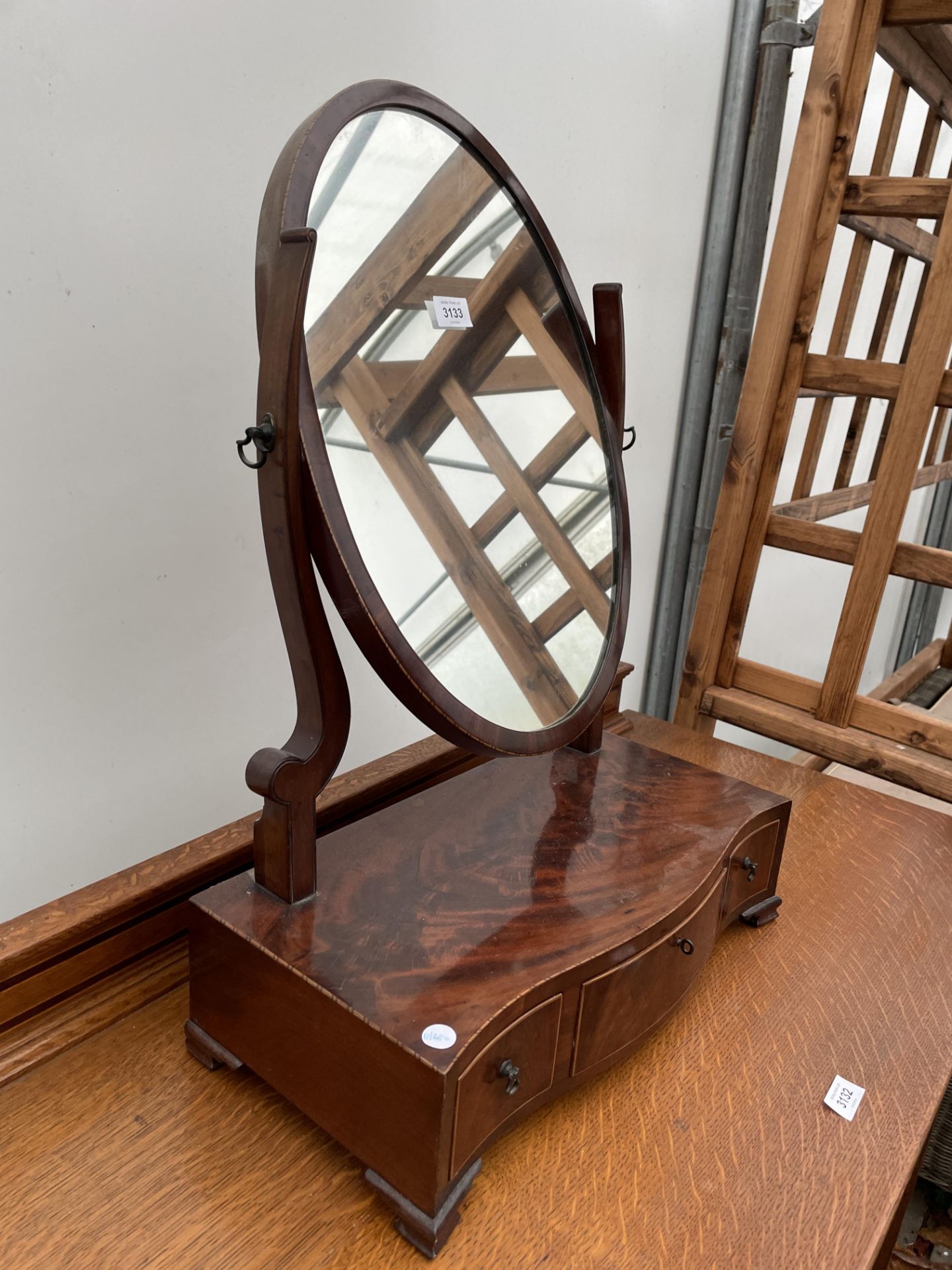 A 19TH CENTURY MAHOGANY SWING FRAME DRESSING MIRROR