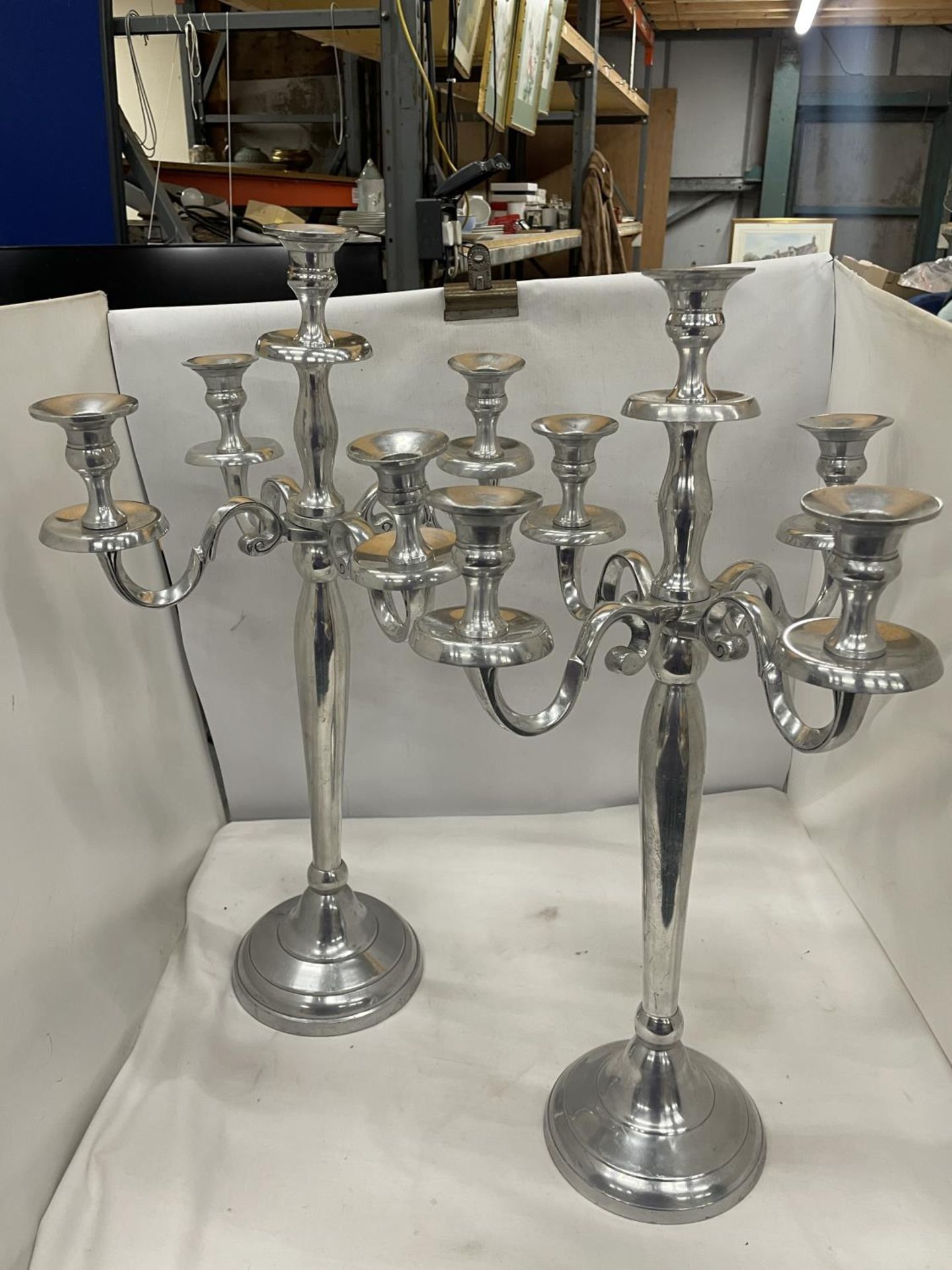 A PAIR OF TALL FIVE BRANCH CANDELABRAS