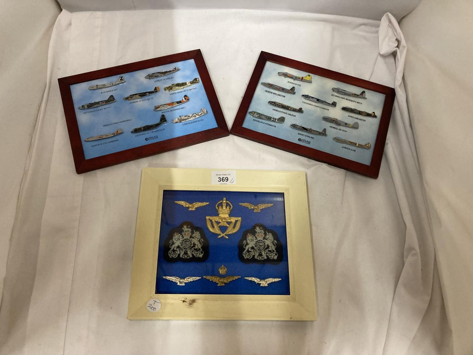 A FRAMED COLLECTION OF RAF BADGES AND TWO FRAMED PLANE COLLECTIONS