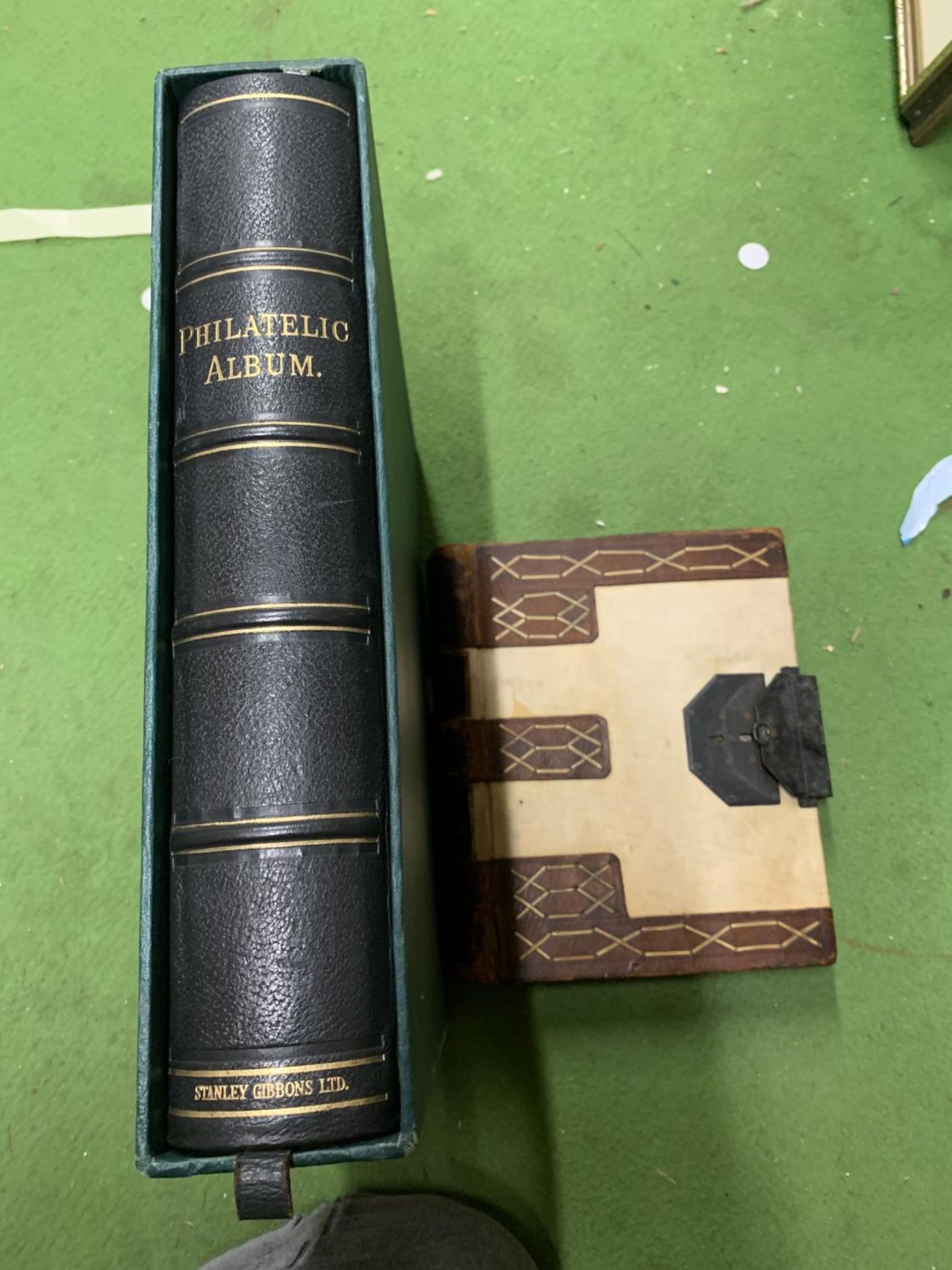 A VINTAGE PHILATELIC ALBUM , BOXED PLUS AN 1830'S CASH BOOK