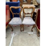 A PAIR OF VICTORIAN ELM DINING CHAIRS