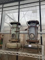 A PAIR OF VINTAGE PARAFIN GREENHOUSE HEATERS