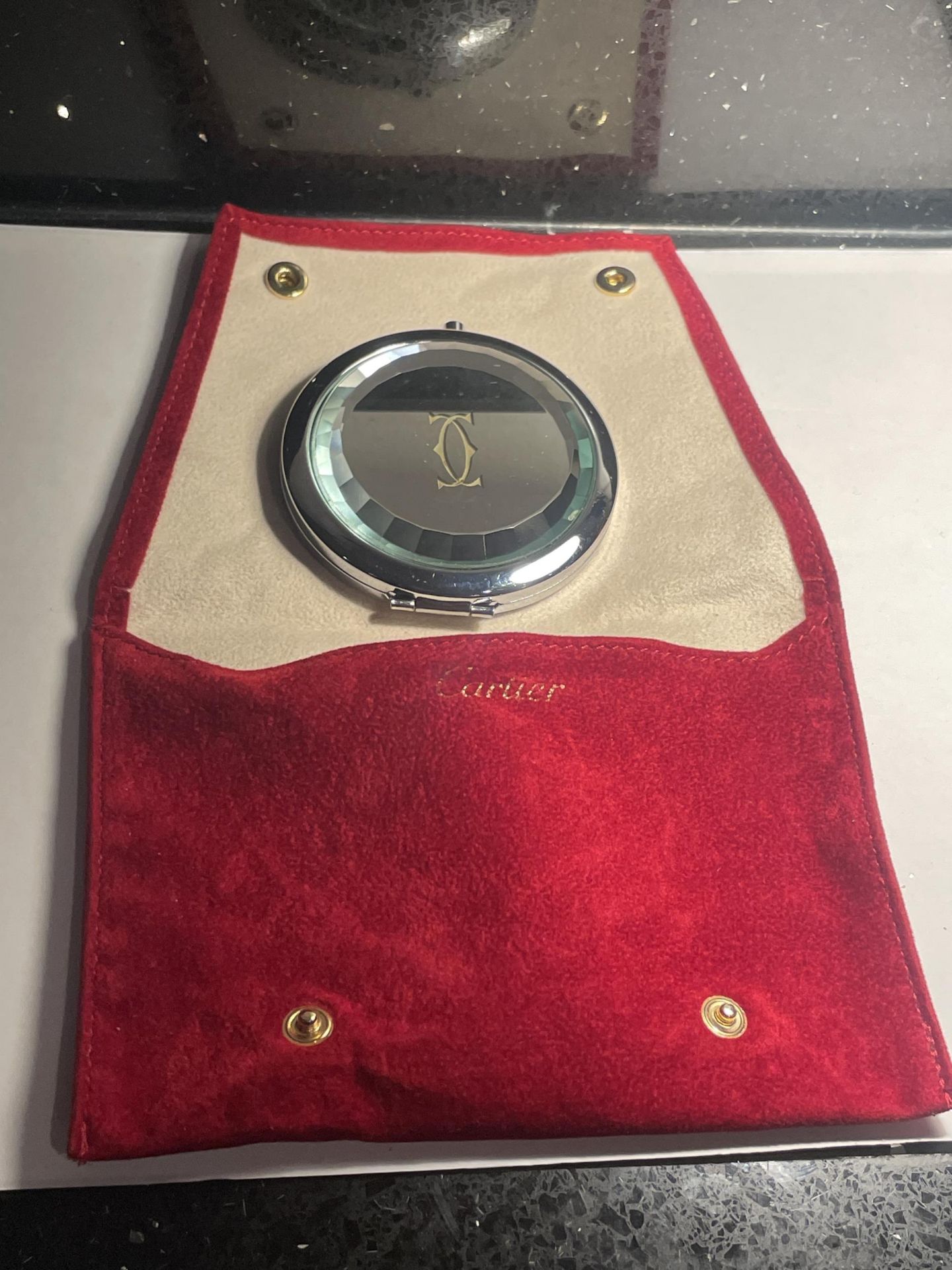 A CARTIER COMPACT WITH DUST CASE