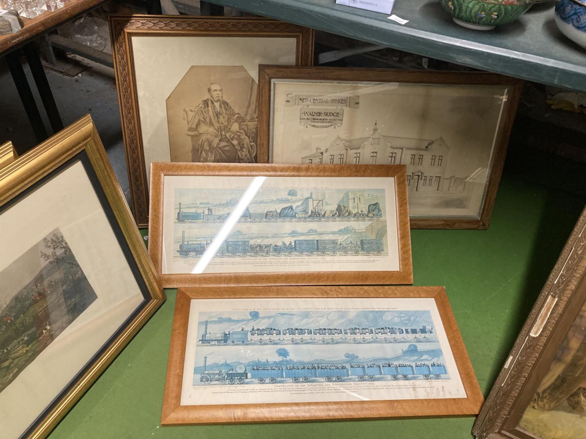 FOUR FRAMED PRINTS TO INCLUDE TRAVELLING ON THE LIVERPOOL AND MANCHESTER RAILWAY 1831, A PRINT OF
