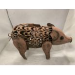 A LARGE PINK TIN PLATE GARDEN PIG, HEIGHT 16CM, LENGTH 40CM