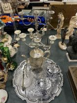 A QUANTITY OF SILVER PLATED ITEMS TO INCLUDE CANDLEABRAS, A COFFEE POT, PRESERVE POTS, A TRAY, ETC