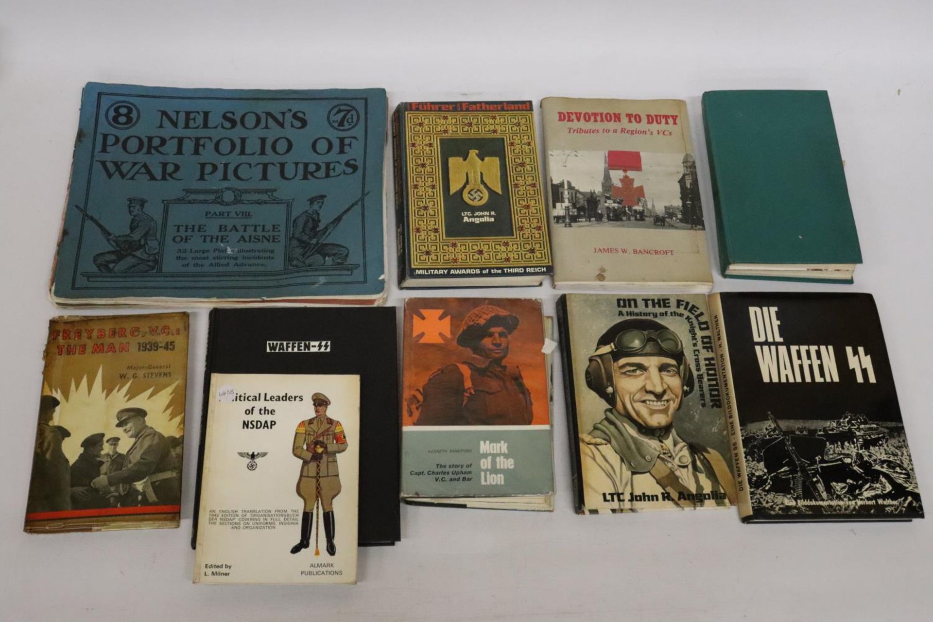 A COLLECTION OF THIRTEEN BOOKS AND BOOKLETS RELATING TO WORLD WAR I AND WORLD WAR II, TO INCLUDE