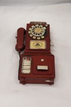 AN UNUSUAL USA VINTAGE TIN PLATE PHONE MONEY BOX, HEIGHT 33CM