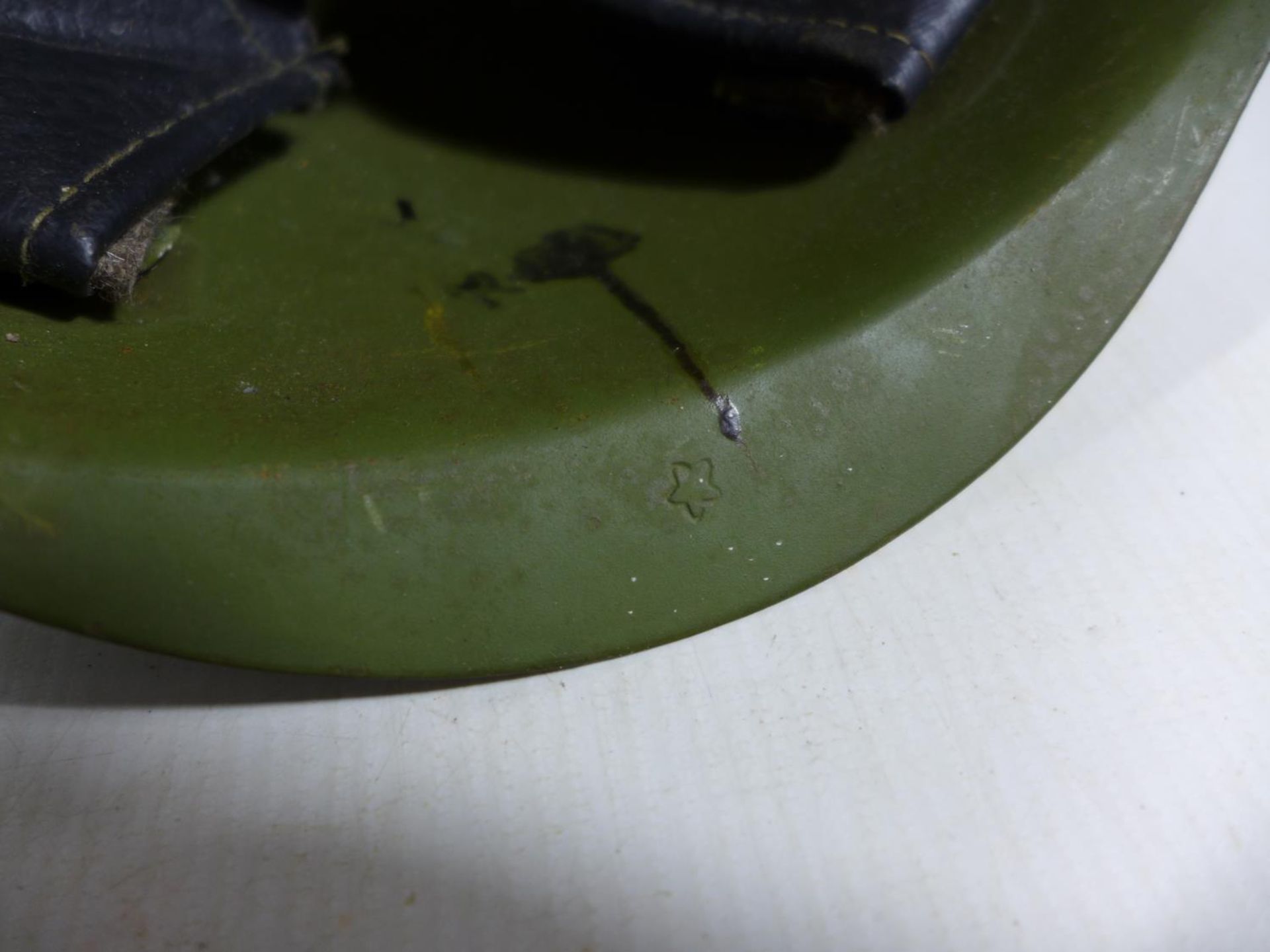 A GREEN PAINTED METAL MILITARY HELMET AND LINING - Image 4 of 5