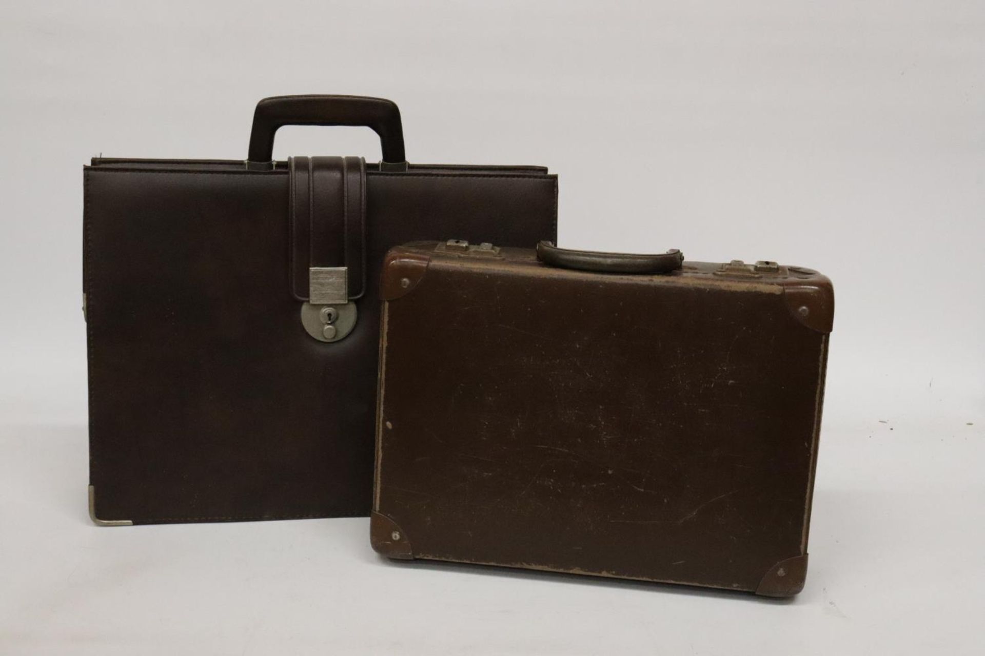 TWO VINTAGE LEATHER BRIEFCASES