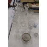 A LARGE QUANTITY OF GLASSWARE TO INCLUDE VASES AND ROSE BOWLS